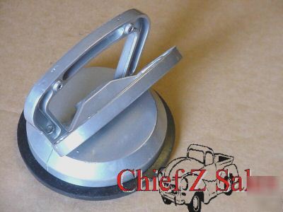 Aluminum handle suction cup lifter on glass metal snap