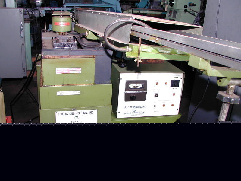 Hollis automatic deep wave soldering system
