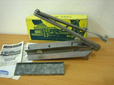 Curv-o-mark contour marker for torch cutting pipe/beam