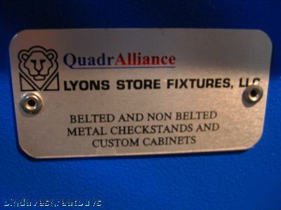 Quadralliance-lyons store fixtures, llc check out stand