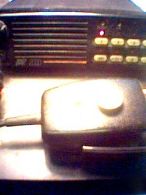 Tait T2010 vhf mobile taxi radio and cradle