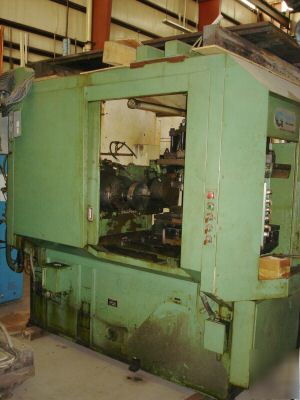 Goss & deleeuw rotary transfer machine, 1988 chucker